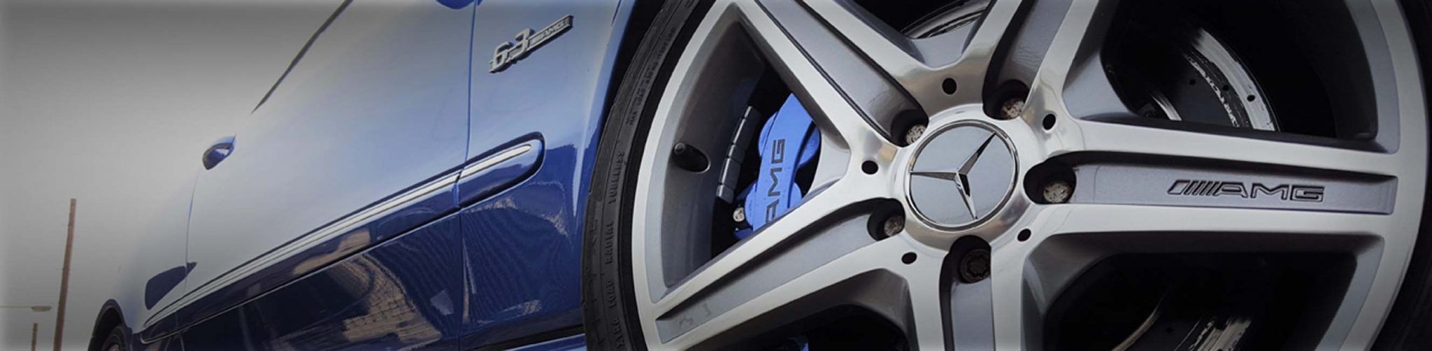 brake calipers painted blue with stenciling