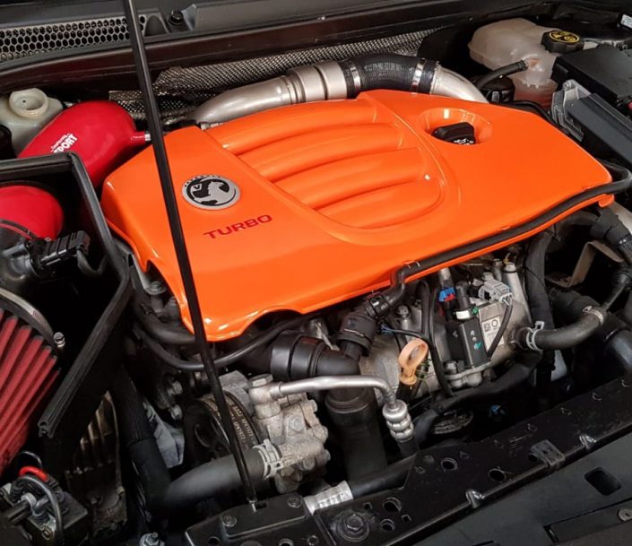 Vauxhall VXR engine cover painted in custom orange pearl
