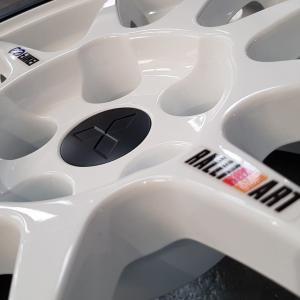 Enkei Jap alloy wheel refurbishment in pearl white on Evo 10