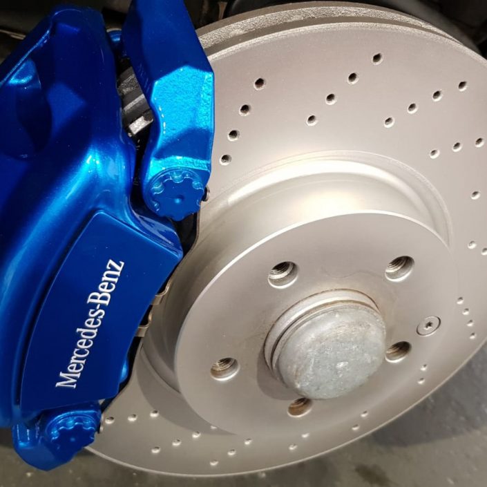 disk centre painting and brake calipers in custom candy blue with white stenciling