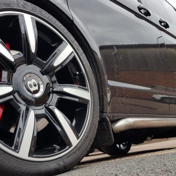 gloss black powder coat and diamond cut Bentley alloy wheels